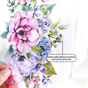 Detail showing the thin translucent material and adhesive backing of floral wall stickers