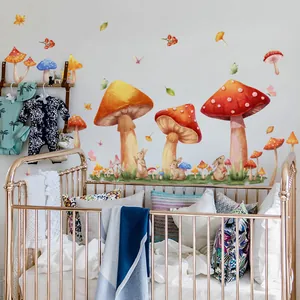 Detail of watercolor mushroom and rabbit wall decals applied in a cozy nursery room