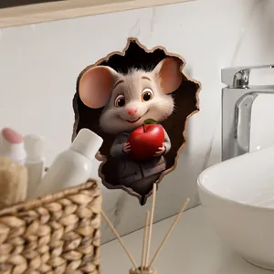 Detail of 3D mouse wall sticker with a cute mouse holding an apple on a marble wall