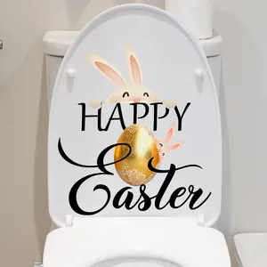 Détail d'autocollant pour toilette de Pâques avec lapin, œuf doré et texte Happy Easter