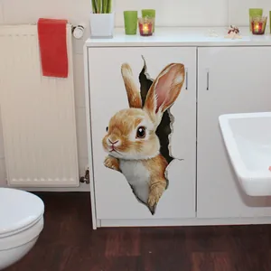 Realistic 3D bunny wall sticker appearing to break through a white bathroom cabinet surface