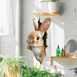 3D wall sticker featuring a realistic bunny popping out from a broken wall on tile surface