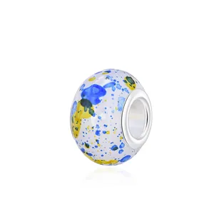 Artistic ink style glass charm bead with blue and yellow patterns for DIY bracelets
