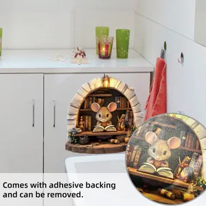 Detail of 3D mouse hole wall sticker featuring a mouse reading in warm lighting