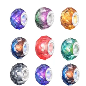 Lot de neuf perles à facettes de 14mm à large trou en couleurs champagne variées