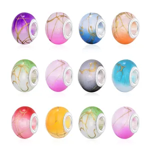Set of 12 resin beads with gold crackle effect and silver large hole metal core