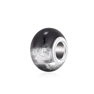 Artistic black and white gradient resin charm bead with polished silver metal core for DIY