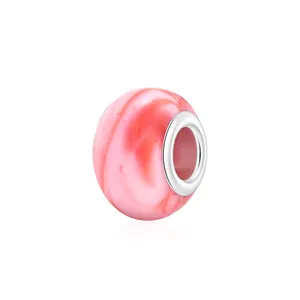 Cuenta de resina jaspeada rosa con agujero grande y núcleo de metal pulido para pulseras