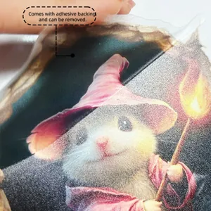 Detail of self-adhesive cartoon mouse sticker showing removable backing and matte texture
