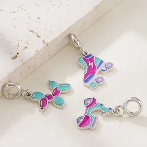 DIY charm pendants set featuring colorful enamel roller skates and balloon dogs