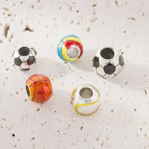 Set of five sports-themed charm beads including football and basketball for DIY bracelets