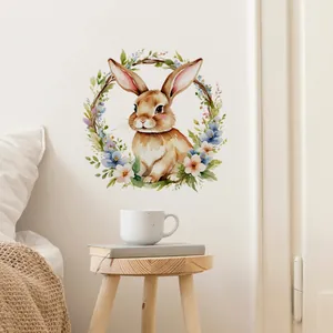 Sticker mural lapin aquarelle et couronne florale dans un décor de chambre douillet