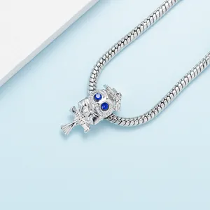 Silver owl charm with blue rhinestone eyes on a snake chain DIY jewelry piece
