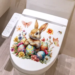 Sticker de toilette de Pâques avec lapins à l'aquarelle, œufs et fleurs colorés