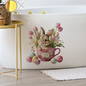 Sticker mural lapin de Pâques dans une tasse rose sur baignoire avec fleurs et œufs