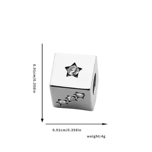 Cube charm bead with star cutout and sparkling zircon inlay in polished silver finish