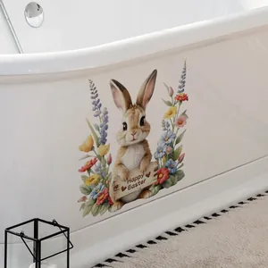 Détail d'autocollant lapin de Pâques et fleurs sur le côté d'une baignoire blanche