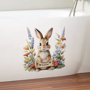 Détail de l'autocollant de lapin de Pâques avec fleurs peintes sur une baignoire