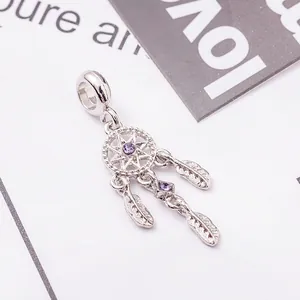 Silver dreamcatcher charm pendant with purple gemstone and delicate feathers jewelry