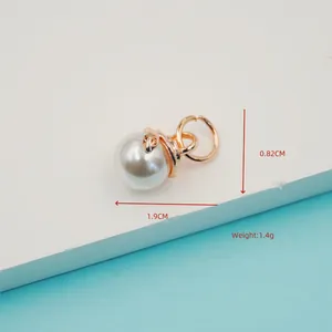 Elegant gold snake wrapped pearl pendant with dual metal rings and 1.9cm length detail