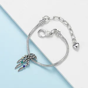 Silver snake chain bracelet with dreamcatcher moon pendant and colorful gemstones