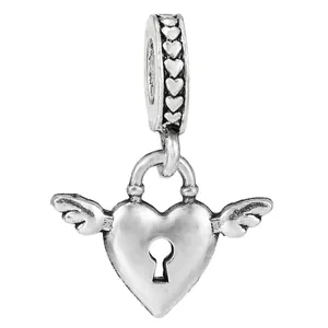 Silver winged heart charm with keyhole detail and engraved loop for DIY bracelets