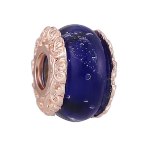 Dark blue glass charm bead with rose gold filigree detail for DIY bracelet jewelry