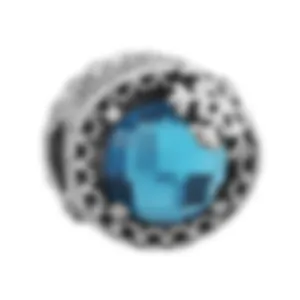 Sterling silver charm with heart-shaped sapphire blue crystal and star hollow cutouts