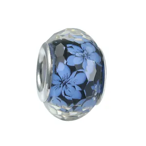 Blue faceted glass charm bead with floral interior for DIY bracelet jewelry