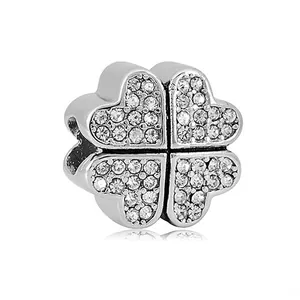 Silver four-leaf clover charm with sparkling pave-set zircons for DIY charm bracelets