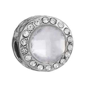 Silver crown charm with central faceted stone and halo pave settings for DIY bracelets