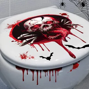 Dettaglio di adesivo per WC di Halloween con teschio realistico e schizzi di sangue rosso