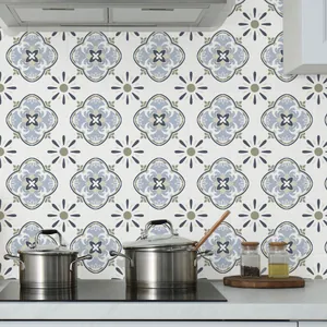 Grey-white mandala geometric tile stickers applied as a backsplash in a modern kitchen setting