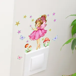 Detail of cartoon fairy wall stickers around a light switch with stars and mushrooms