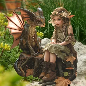 Detail of iron garden stake showing a fairy and dragon sculpture with rustic metal finish