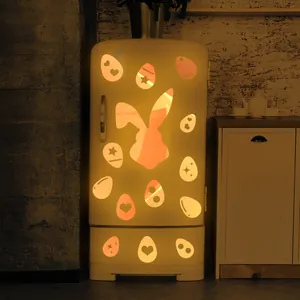 Luminous Easter bunny and egg stickers on a vintage fridge for cozy home decoration