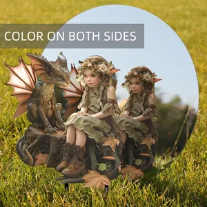 Detail of double-sided fairy and dragon garden stake with vibrant floral colors