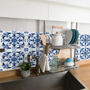 Kitchen backsplash featuring blue and white mandala floral pattern tile stickers