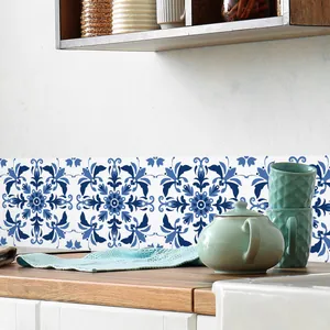 Detail of blue and white mandala tile stickers applied to a kitchen backsplash area