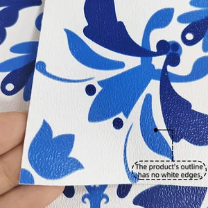Detailed macro view showing the blue floral tile sticker texture and no white edges