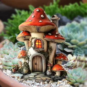 Detail of mushroom fairy house garden stake with textured door and window for outdoor decor