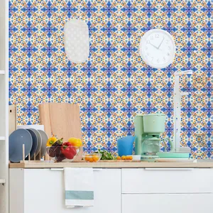 Detail of blue and orange mandala tile stickers applied on a kitchen backsplash wall