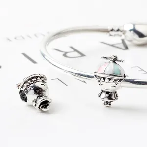 Sterling silver snake chain bracelet with cartoon boy charm featuring a colorful enamel hat