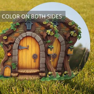 Detail of fairy garden gate with double-sided painting and textured tree bark design