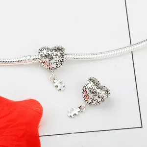 Pendentif cœur puzzle argenté avec petite breloque pour bracelet maille serpent