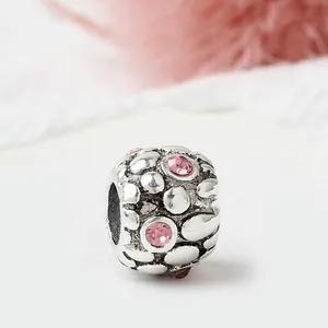 Silver bead charm with pink crystals and pebble texture for DIY charm bracelets