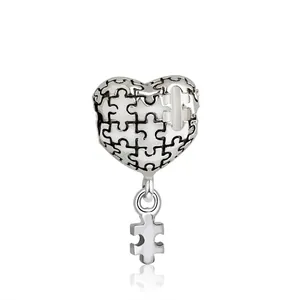 Pendentif cœur puzzle en argent créatif avec découpes précises et breloque mobile