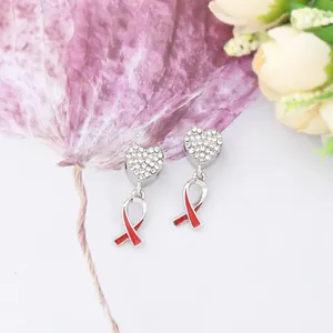 Glittering diamond heart pendant earrings with red ribbon charm for health awareness