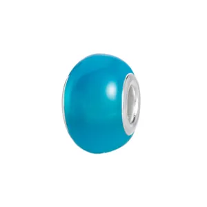 Detailed view of a bright blue synthetic cat-eye charm bead with a silver metal center