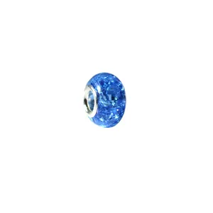 Macro detail of dark blue ice-crack resin charm bead with silver metal core for DIY bracelet